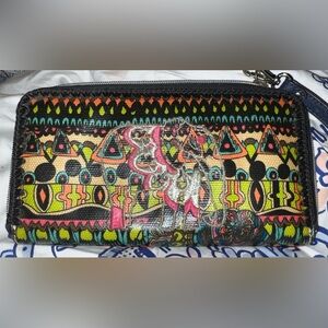 Sakroots wallet in like new condition, black background with elephant